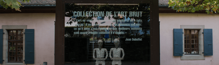 Collection de l'Art Brut exterior with glass panel quote, sculptural figures, light walls, blue shutters.