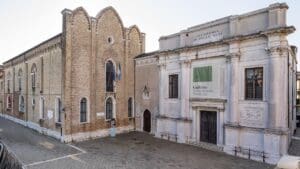 Exterior of the Gallerie dell'Accademia in Venice, showing two historic adjoining buildings.