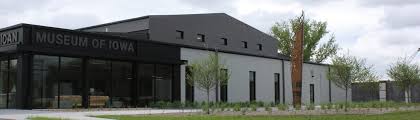 Museum of Iowa exterior with modern design, large windows, and landscaped surroundings