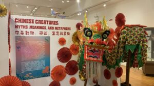 Myths, Meanings, and Metaphors" featuring a Chinese dragon head.