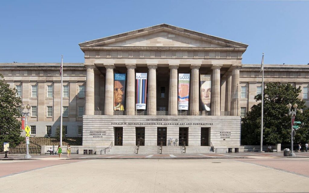 Smithsonian American Art Museum and National Portrait Gallery in neoclassical building with tall columns.